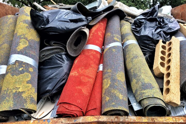 Can I Put Carpet and Tile in a Commercial Dumpster?